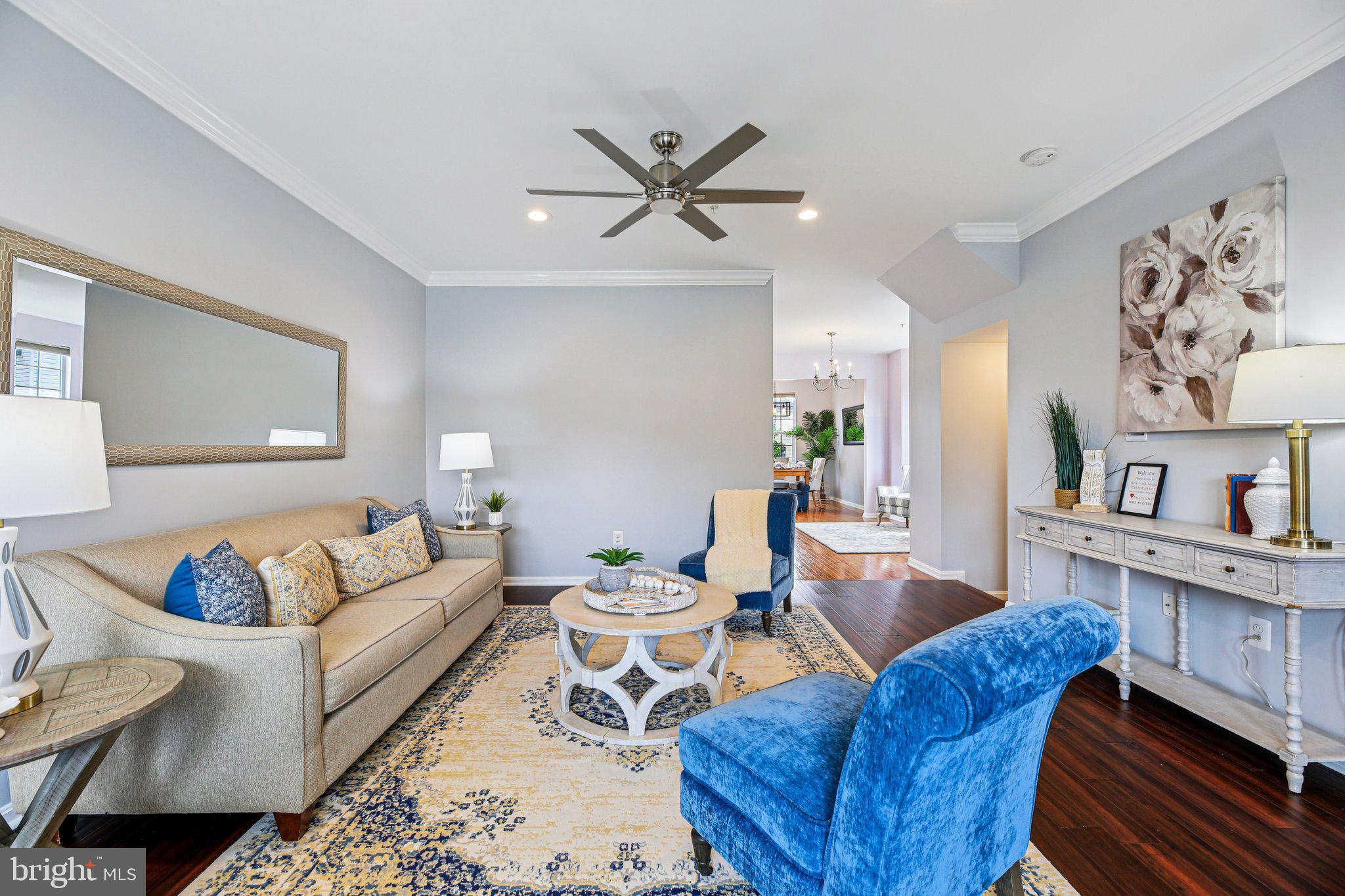 690 Tivoli Road Frederick, MD 21703 - Photo 7 of 43 a living room with furniture and wooden floor