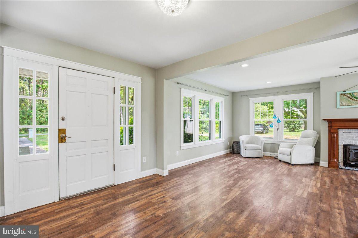 16146 Thomas Road Piney Point, MD 20674 - Photo 25 of 70 a view of livingroom with furniture and floor to ceiling window