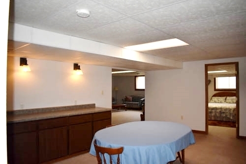 25109 Indian Ridge Road Sterling, IL 61081 - Photo 28 of 34 a kitchen with a table and chairs