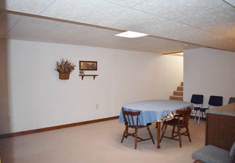25109 Indian Ridge Road Sterling, IL 61081 - Photo 30 of 34 a view of a livingroom with furniture and a window