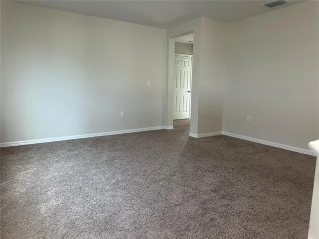 an empty room with an entryway