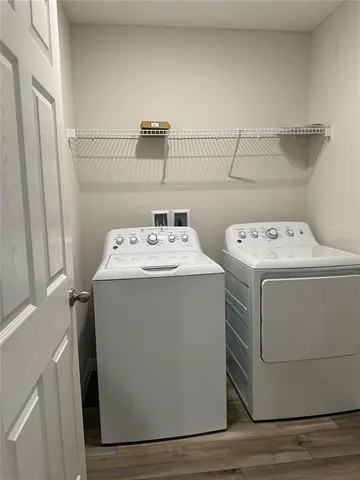 a utility room with dryer and washer