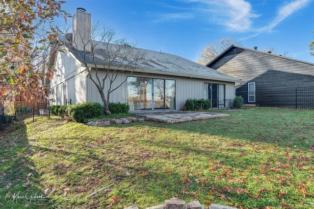 a house view with a swimming pool