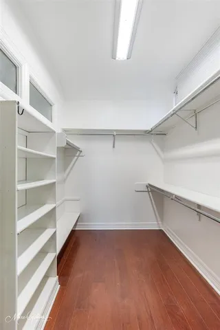 a view of an empty walk in closet