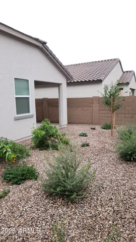 a view of park with floor to ceiling windows