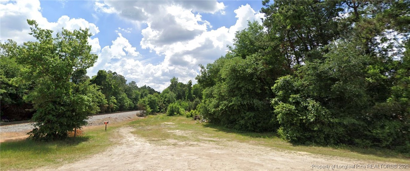 Tbd Yadkin Road Southern Pines, NC 28387 - Photo 2 of 2 a view of yard with green space