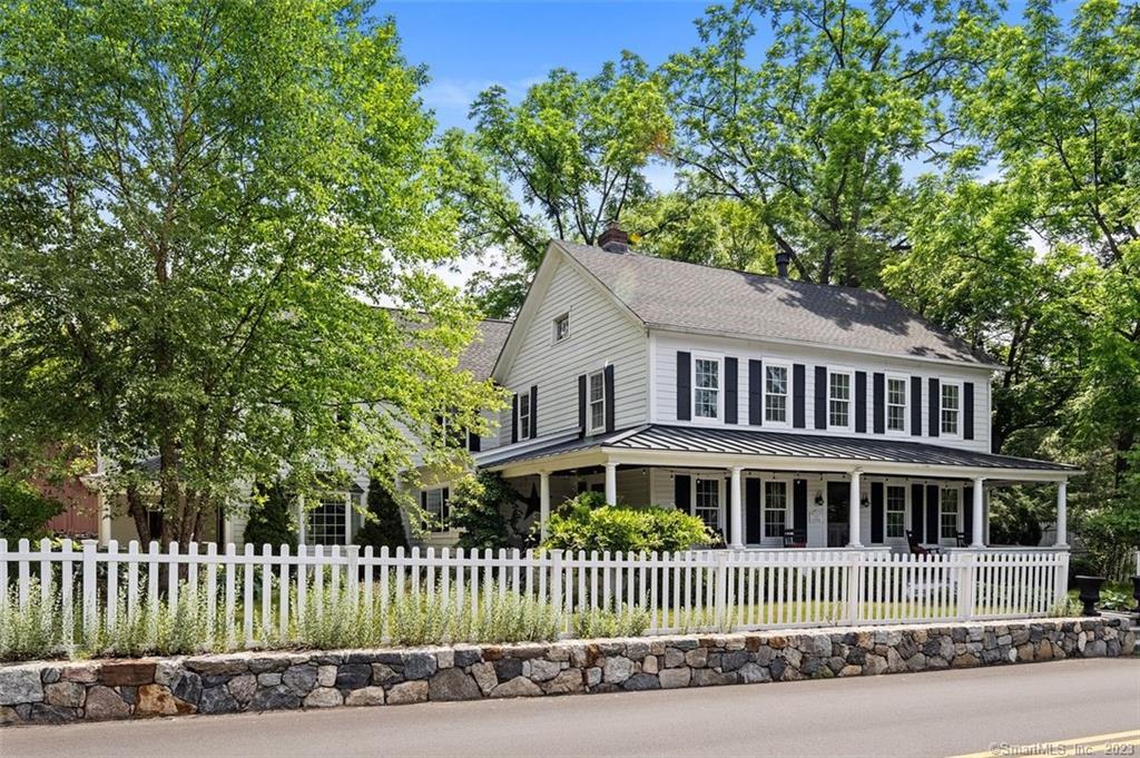 129 Long Meadow Hill Road Brookfield, CT 06804 - Photo 1 of 1 a front view of a house with a garden
