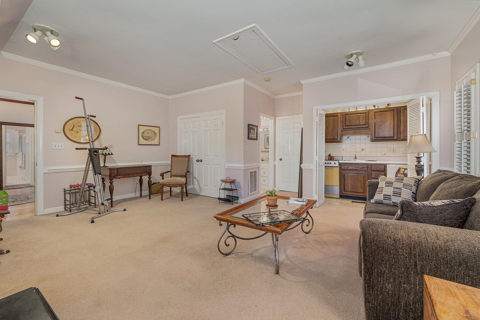 1829 Falls Church Road Raleigh, NC 27609 - Photo 13 of 30 a living room with furniture and a fireplace