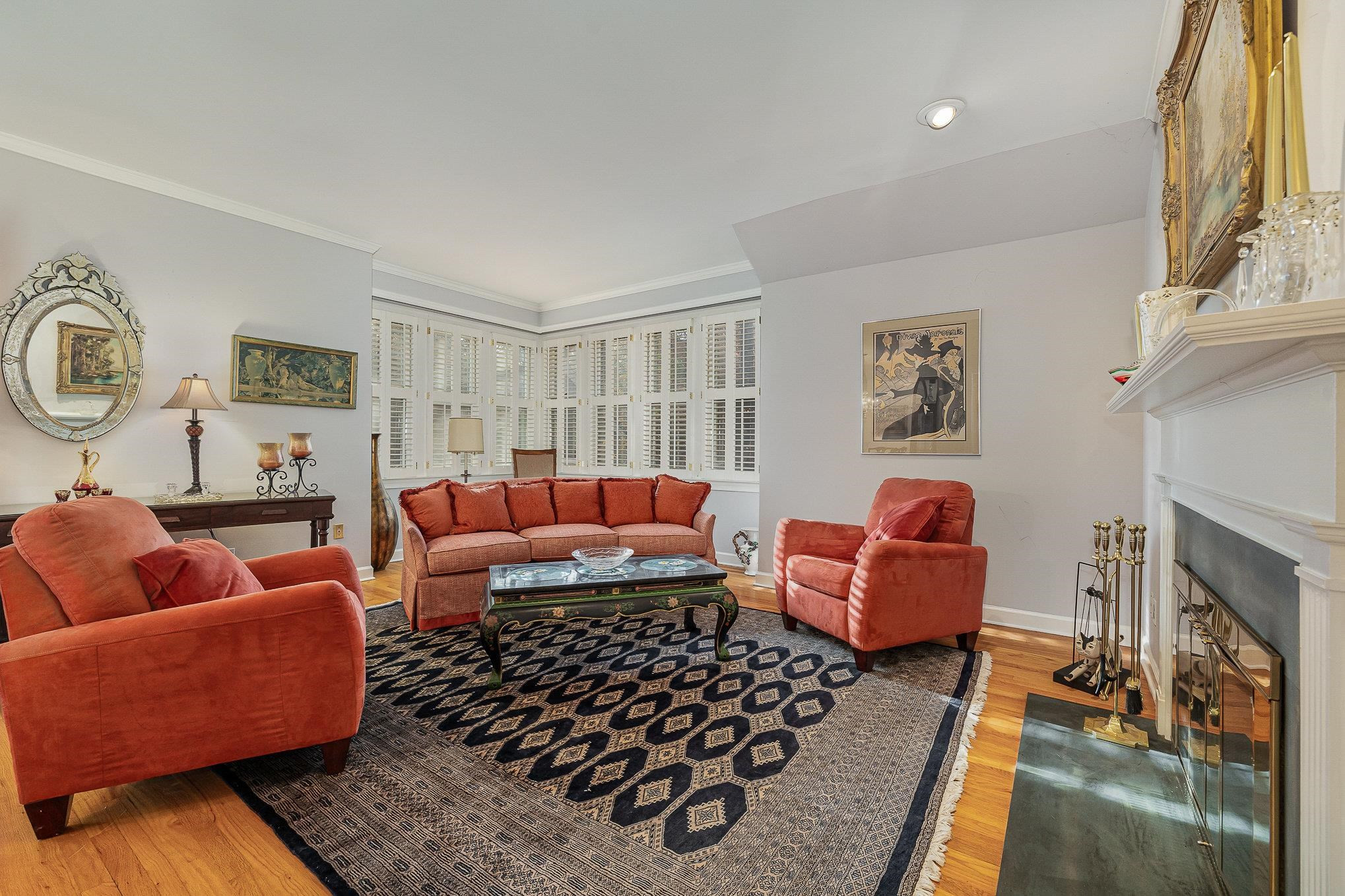 1829 Falls Church Road Raleigh, NC 27609 - Photo 4 of 30 a living room with furniture a rug and a window
