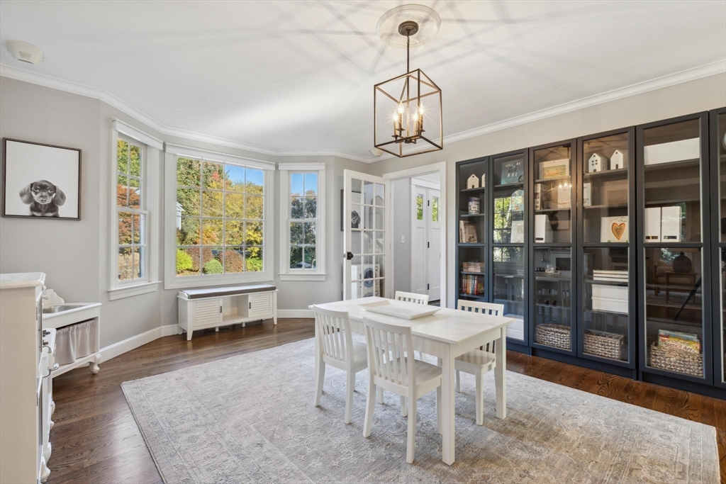 8 MacIntyre Drive North Reading, MA 01864 - Photo 24 of 42 a view of a dining room with furniture window and outside view