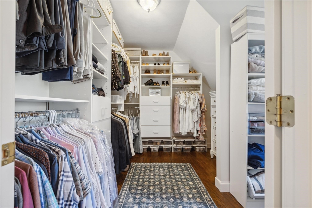 8 MacIntyre Drive North Reading, MA 01864 - Photo 28 of 42 a view of walk in closet with clothes and shoes