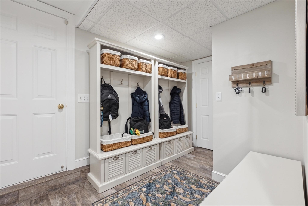 8 MacIntyre Drive North Reading, MA 01864 - Photo 39 of 42 a view of walk in closet with clothes and shoes
