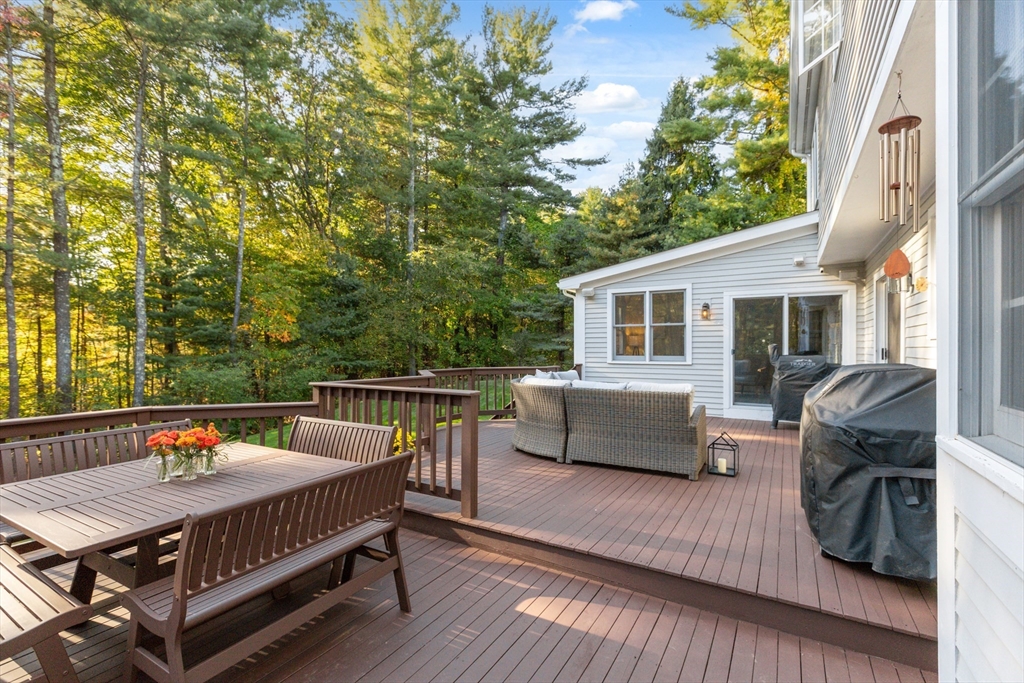 8 MacIntyre Drive North Reading, MA 01864 - Photo 40 of 42 a view of sitting area with furniture and wooden floor