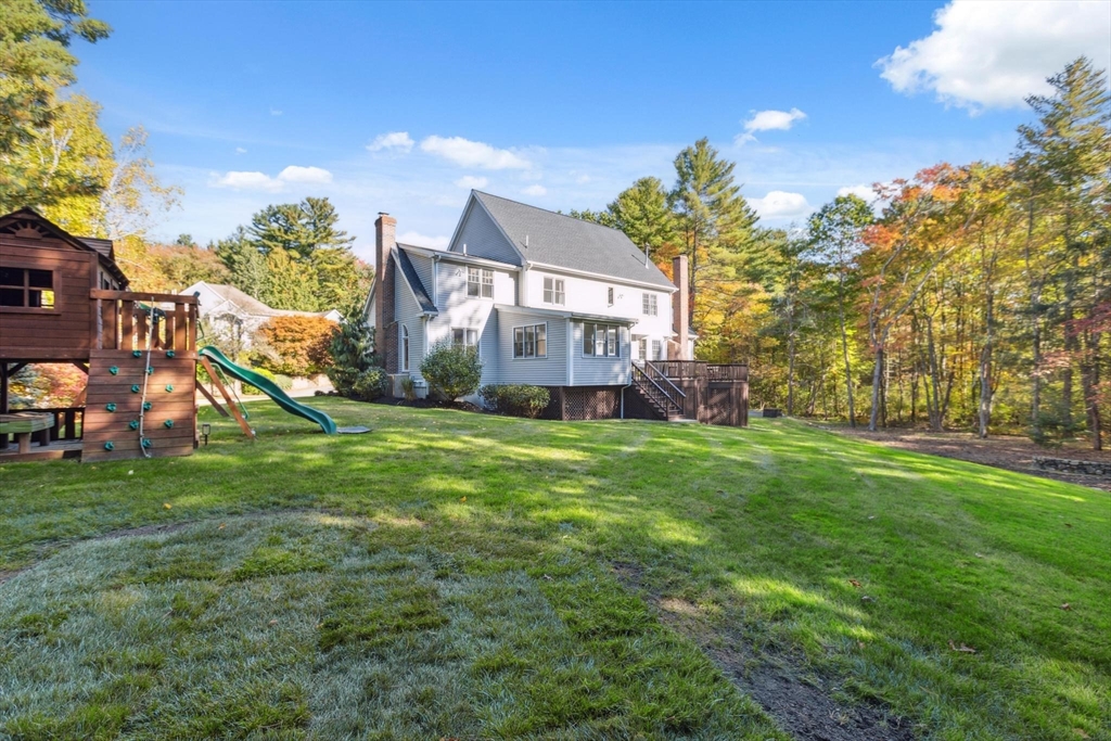 8 MacIntyre Drive North Reading, MA 01864 - Photo 41 of 42 a view of a house with a yard