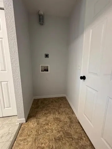 an empty room with a door