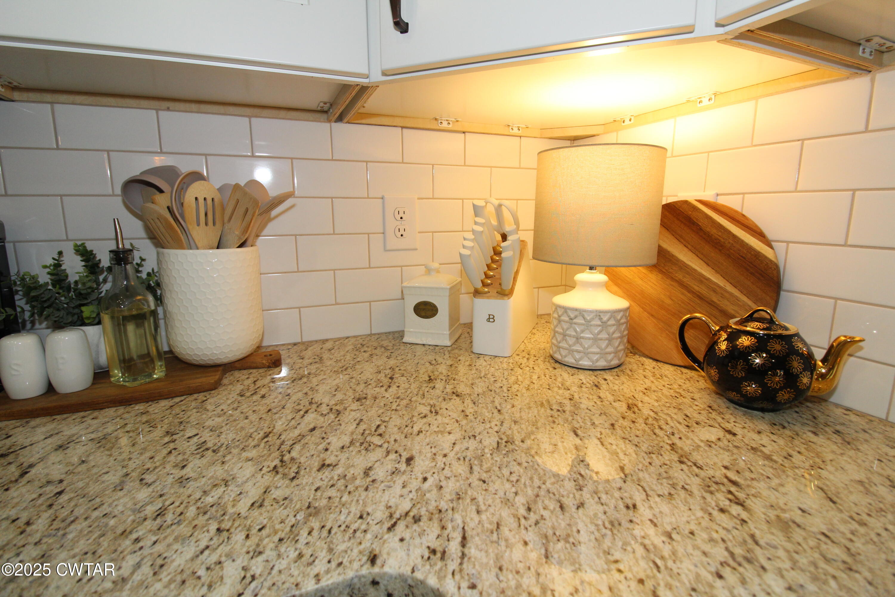 6151 Windsor Drive Milan, TN 38358 - Photo 14 of 25 a bathroom with a sink and a mirror