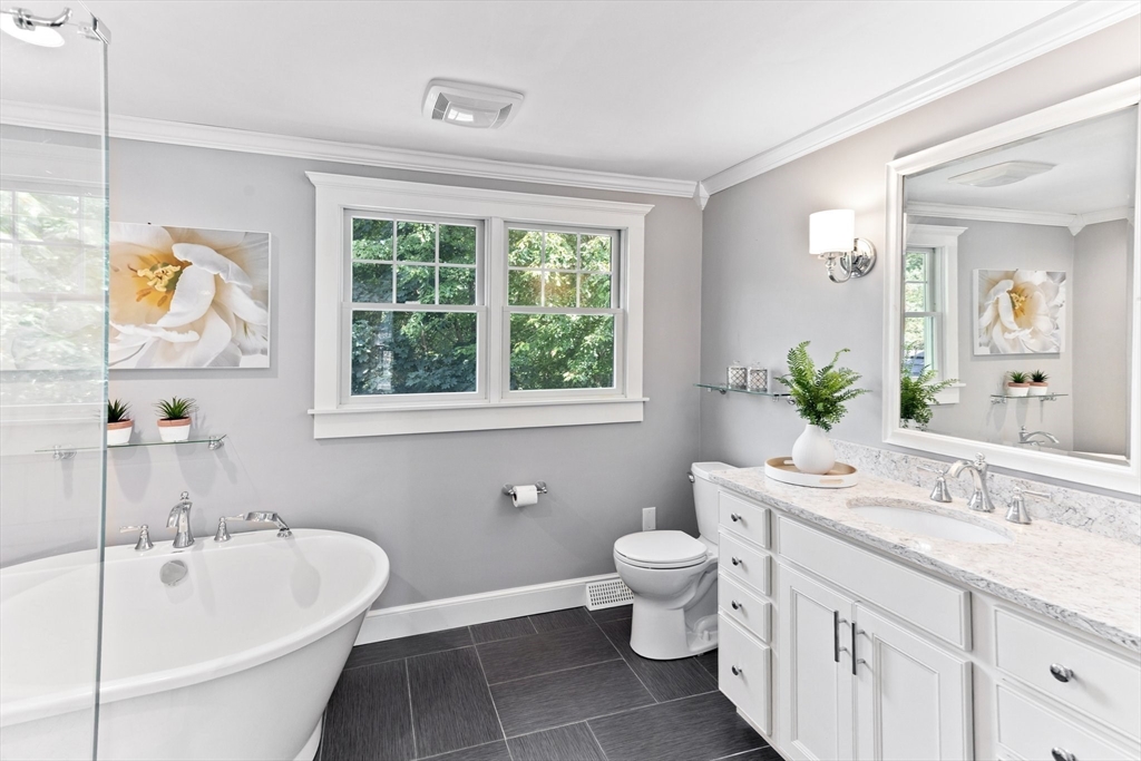 25 Brian Road Bridgewater, MA 02324 - Photo 24 of 39 a bathroom with a granite countertop sink and a bathtub