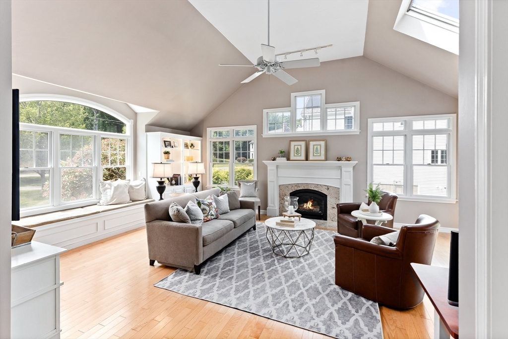 25 Brian Road Bridgewater, MA 02324 - Photo 4 of 39 a living room with furniture and a fireplace