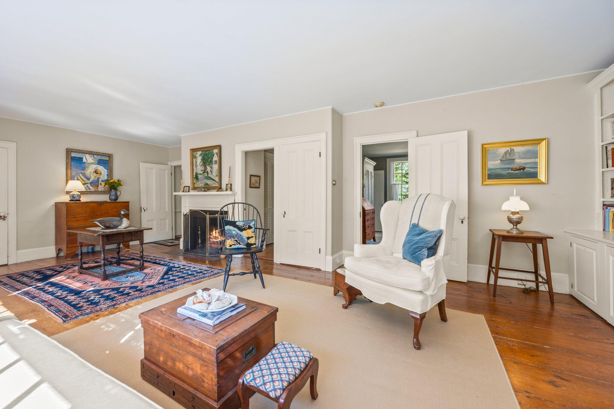 1955 Bridge Road Eastham, MA 02642 - Photo 11 of 77 a living room with furniture and a table