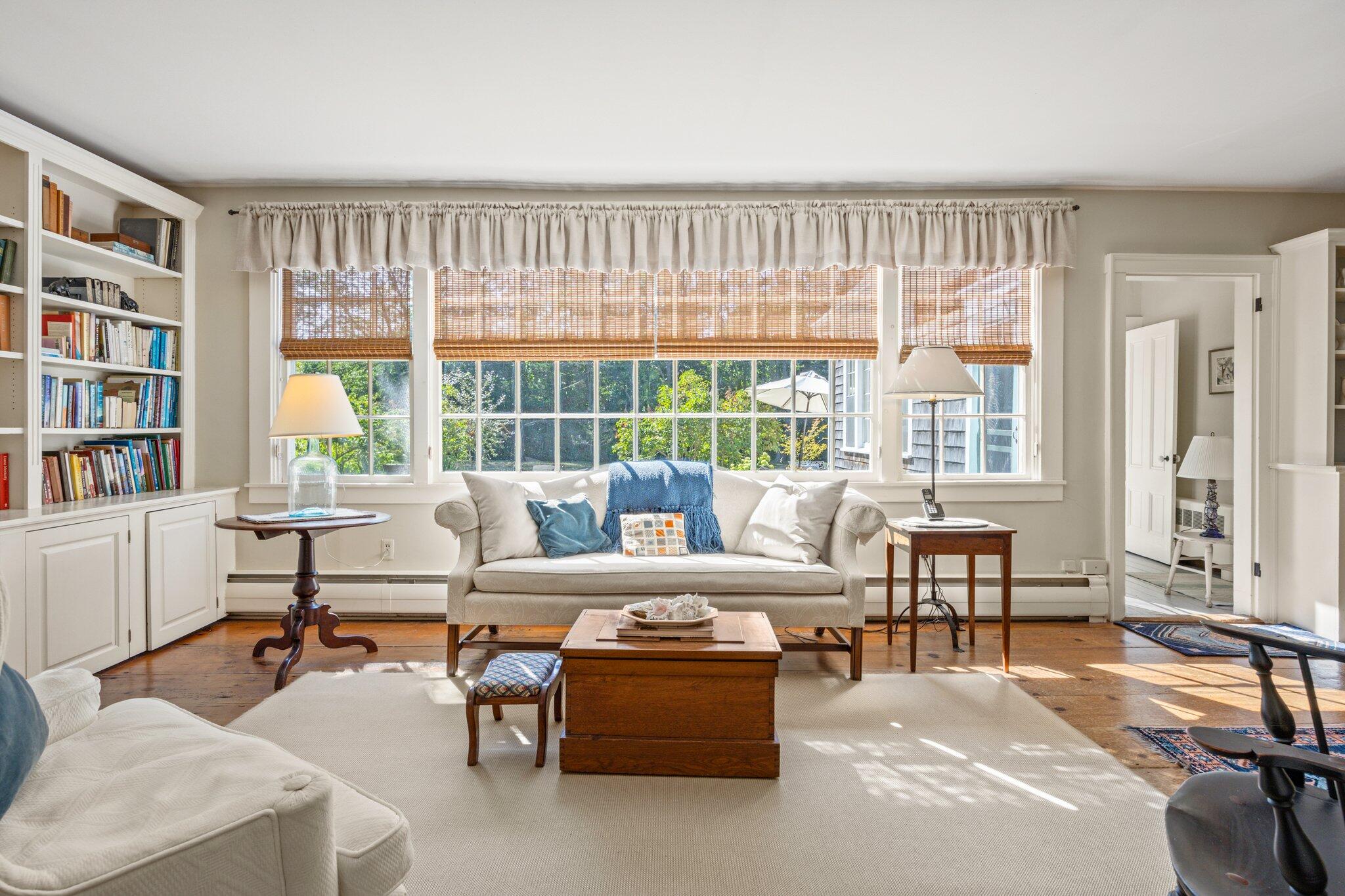 1955 Bridge Road Eastham, MA 02642 - Photo 12 of 77 a living room with furniture and a large window