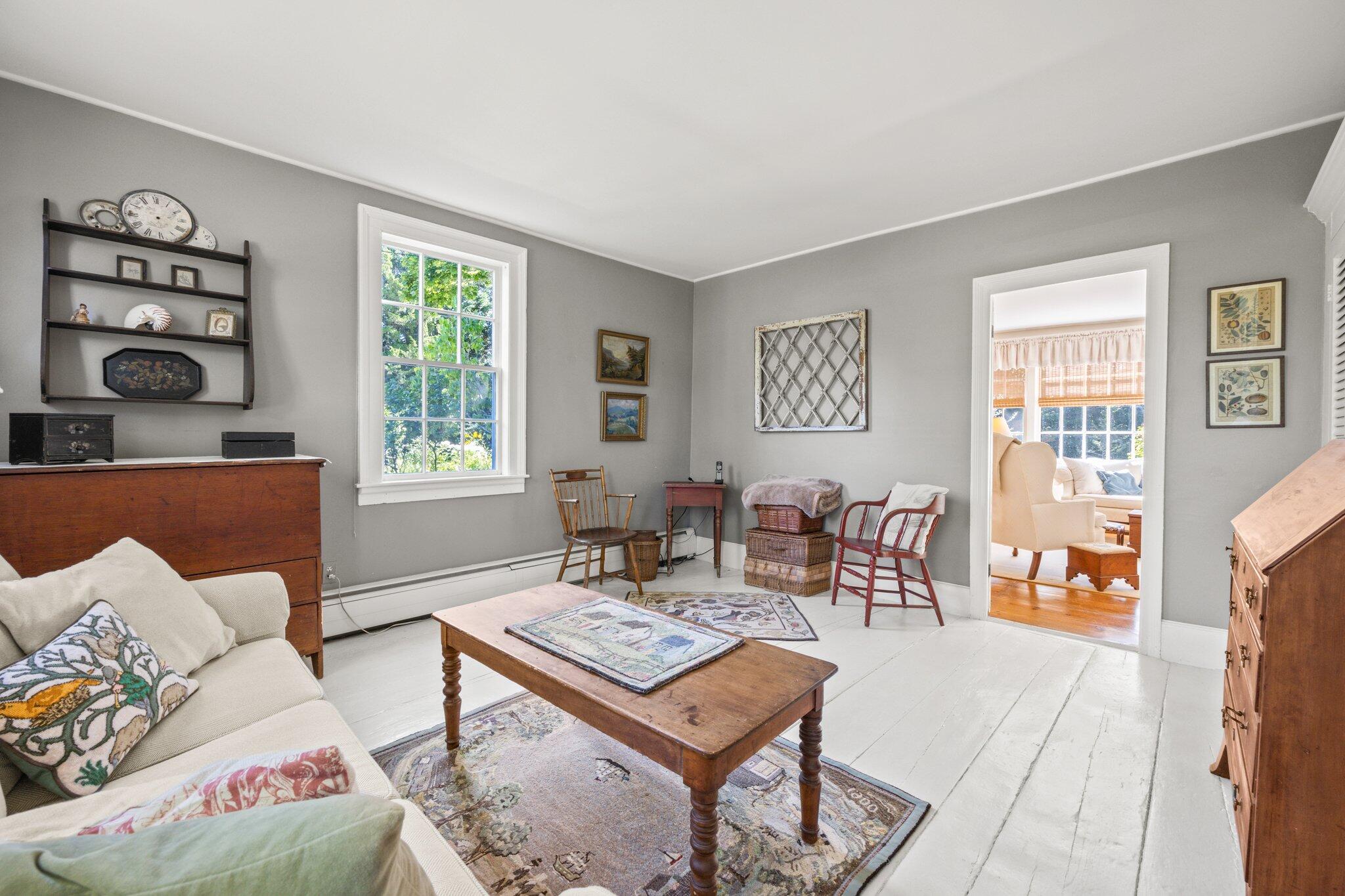 1955 Bridge Road Eastham, MA 02642 - Photo 15 of 77 a living room with furniture a table and a window