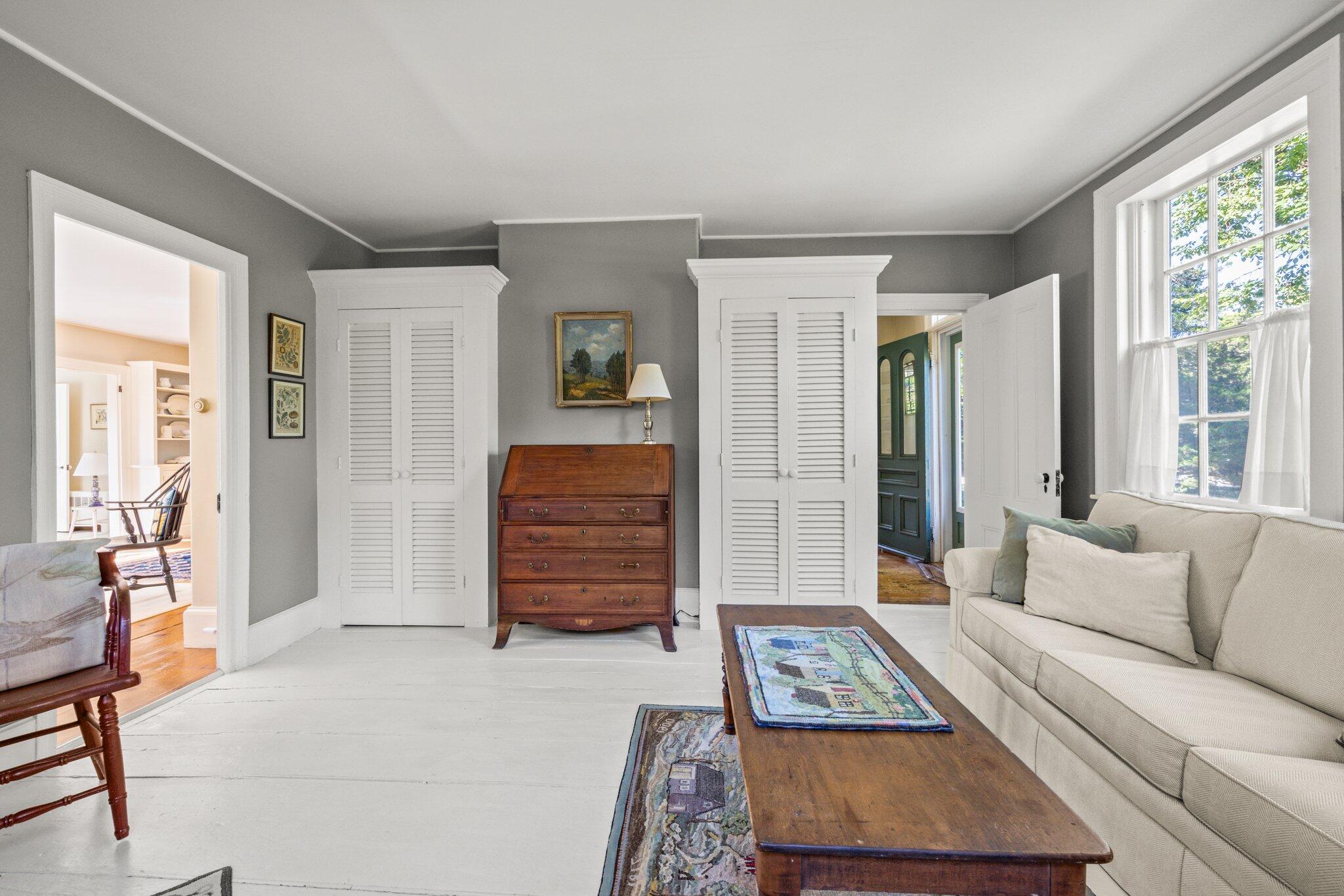 1955 Bridge Road Eastham, MA 02642 - Photo 16 of 77 a living room with furniture and a window