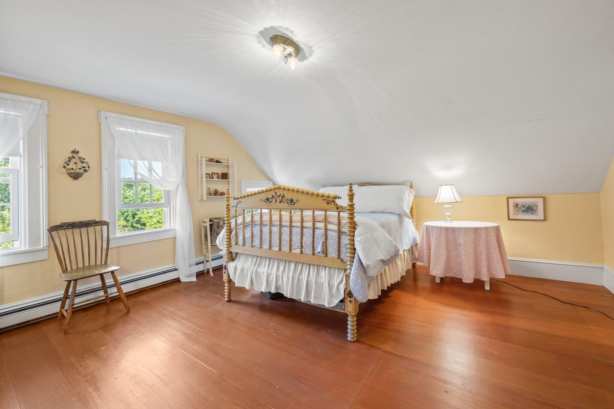 1955 Bridge Road Eastham, MA 02642 - Photo 28 of 77 a bedroom with a bed and a window