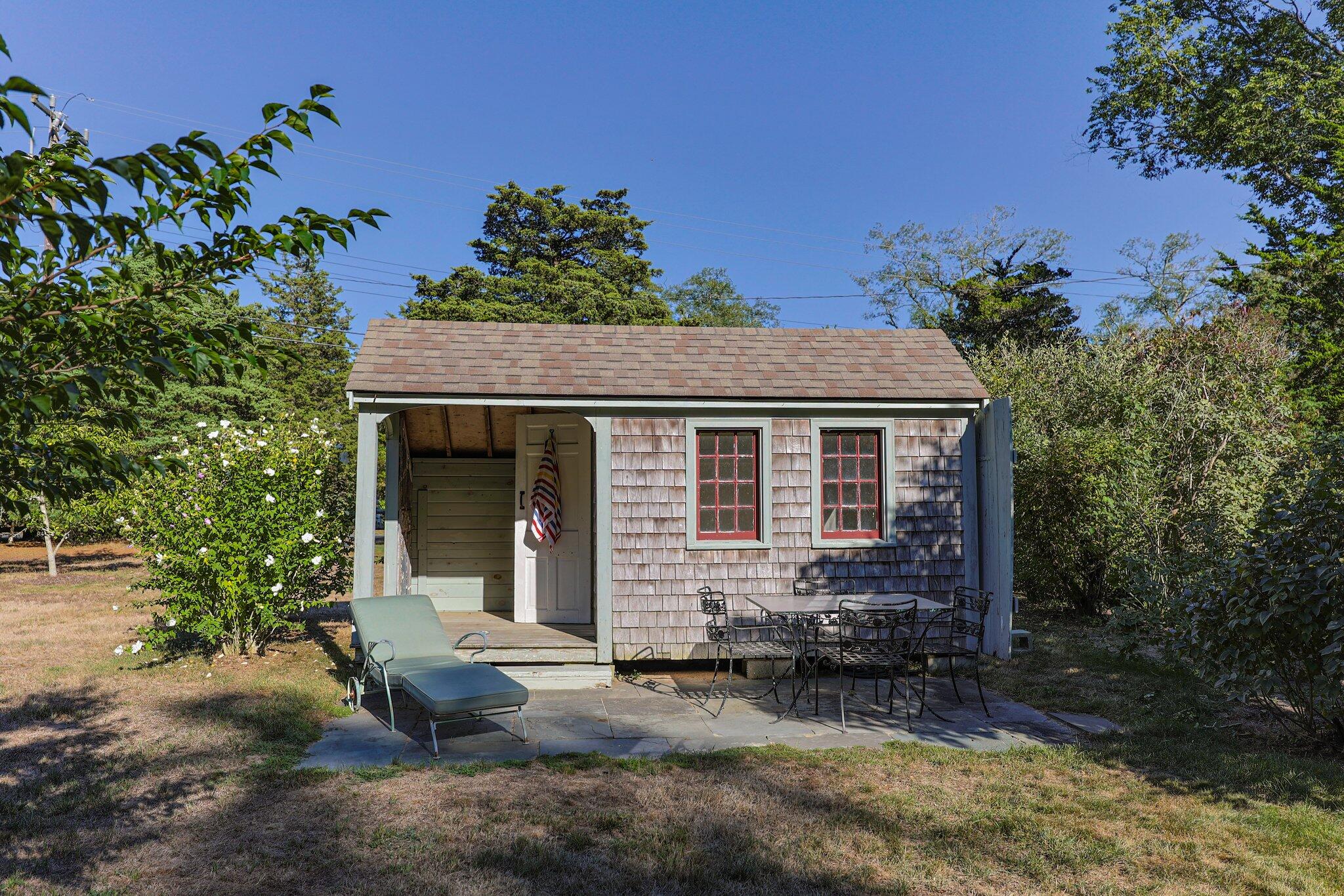 1955 Bridge Road Eastham, MA 02642 - Photo 42 of 77 front view of a house with a yard