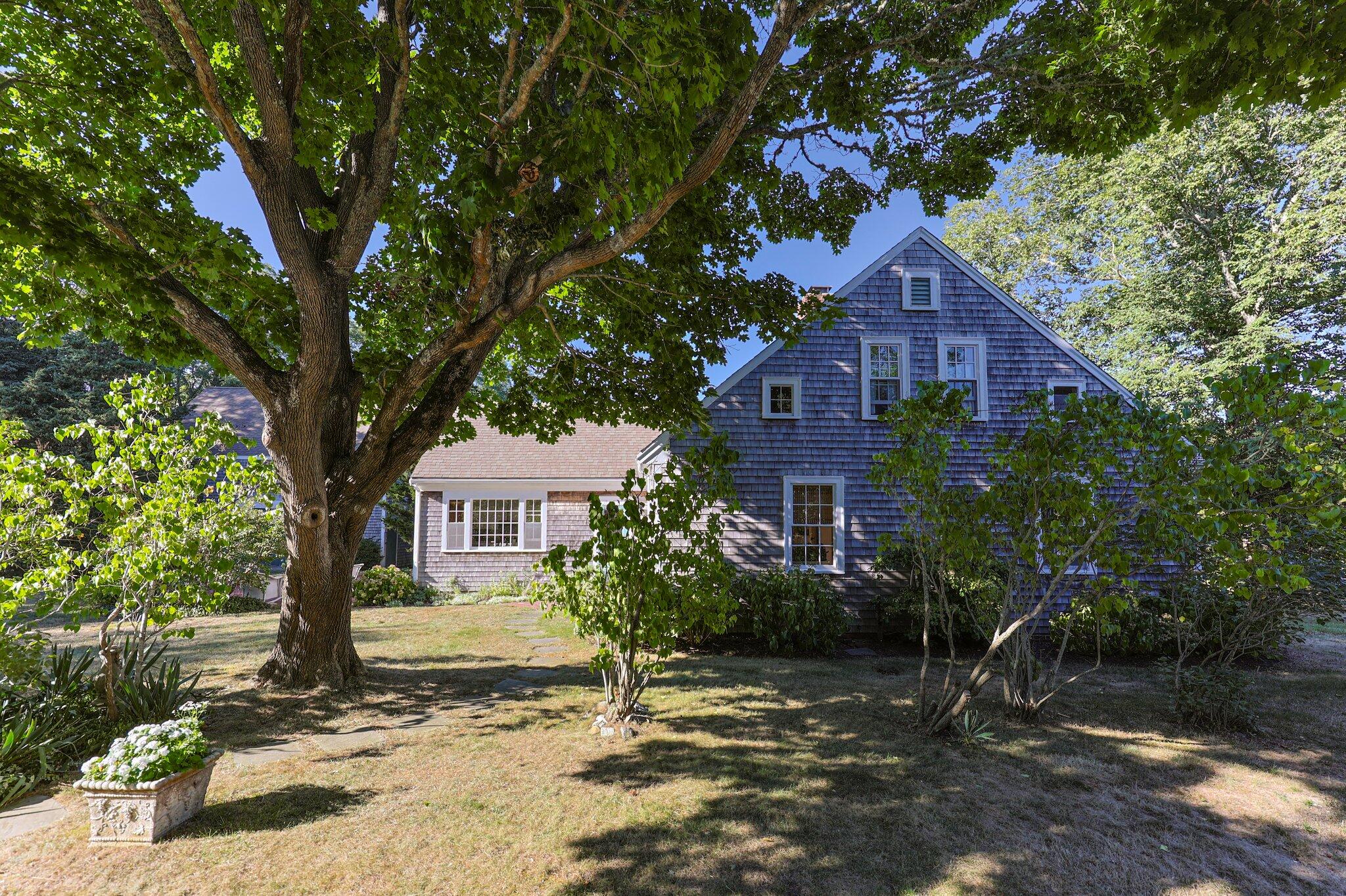 1955 Bridge Road Eastham, MA 02642 - Photo 47 of 77 a front view of a house with a tree