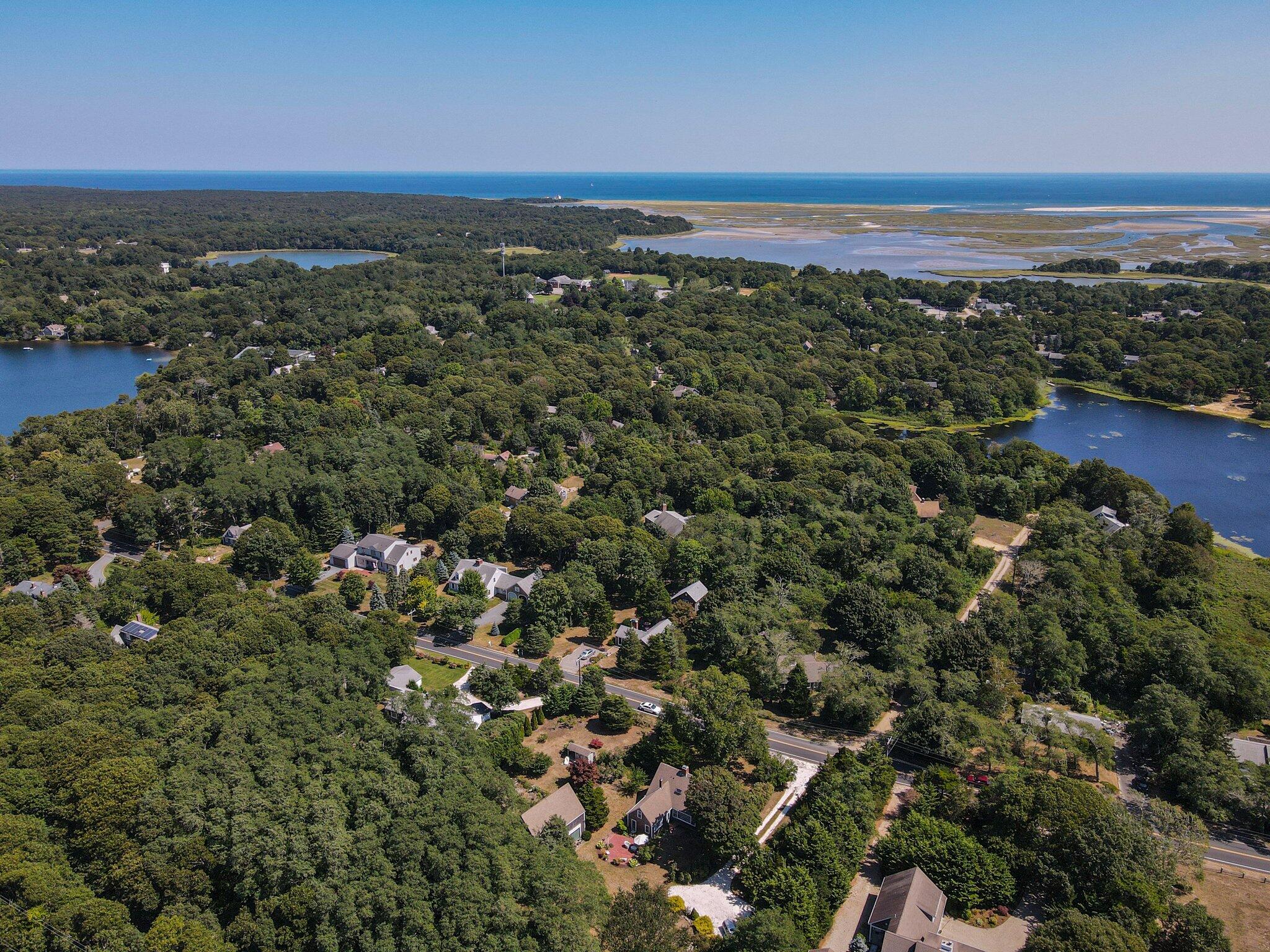 1955 Bridge Road Eastham, MA 02642 - Photo 67 of 77 an aerial view of residential building and ocean