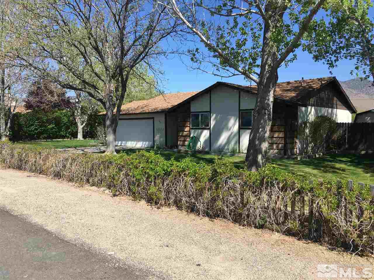 143 Ring Road Dayton, NV 89403 - Photo 3 of 7 a front view of a house with garden