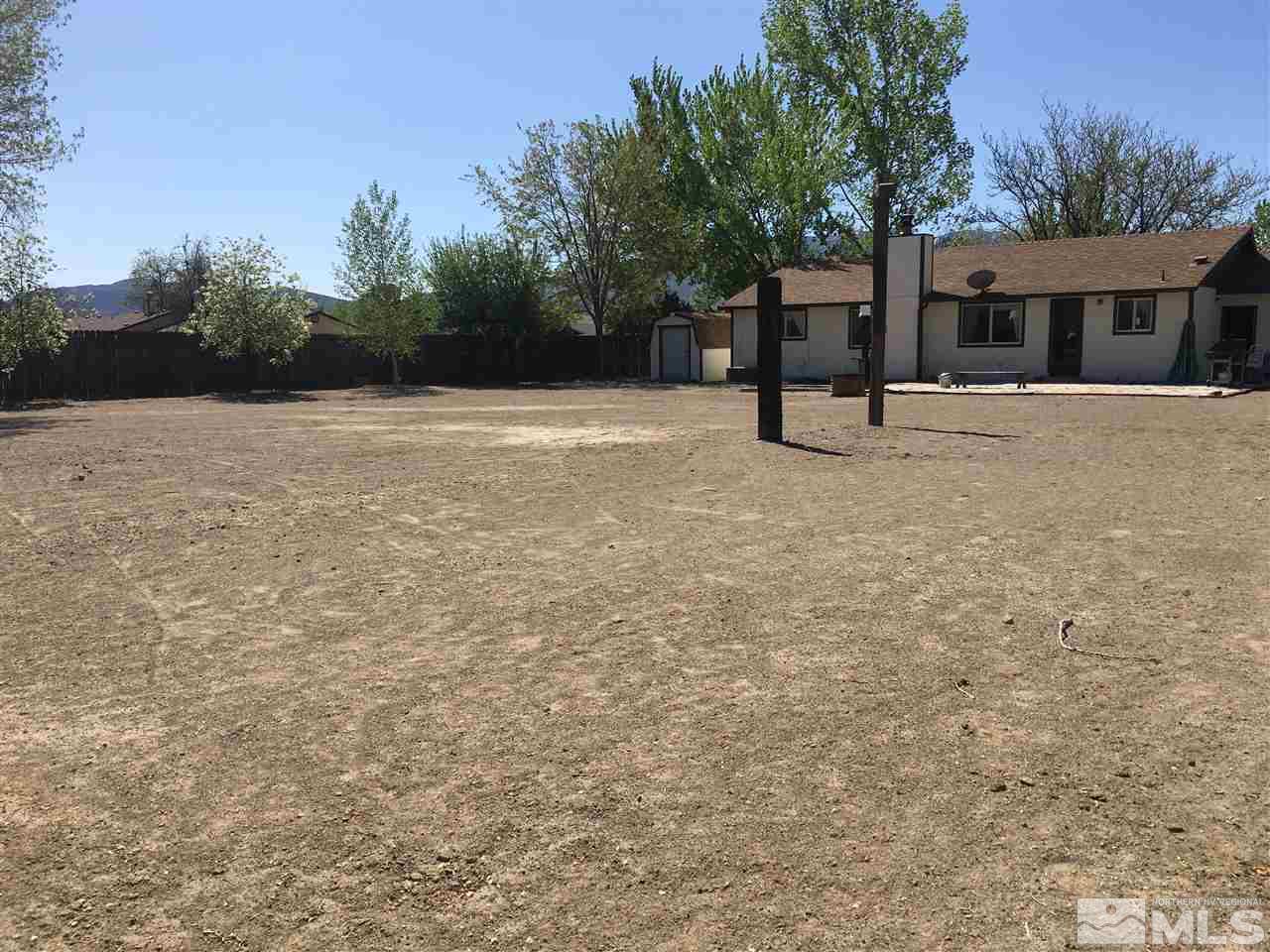 143 Ring Road Dayton, NV 89403 - Photo 4 of 7 a front view of a house with a yard