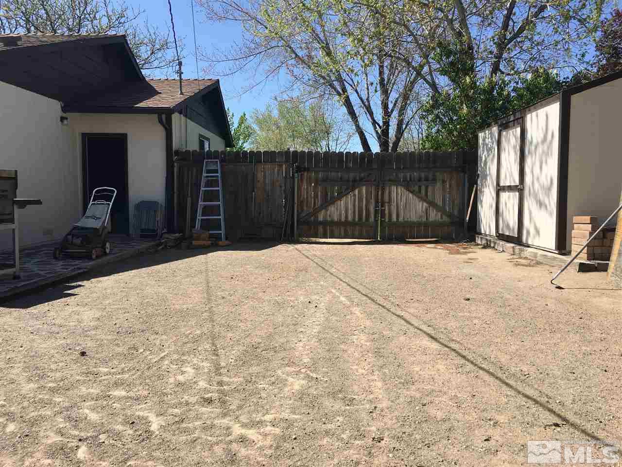 143 Ring Road Dayton, NV 89403 - Photo 5 of 7 a view of backyard and trees