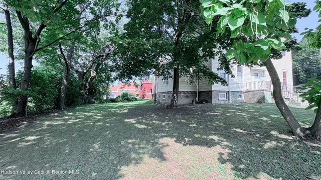 a fire hydrant in the middle of a field
