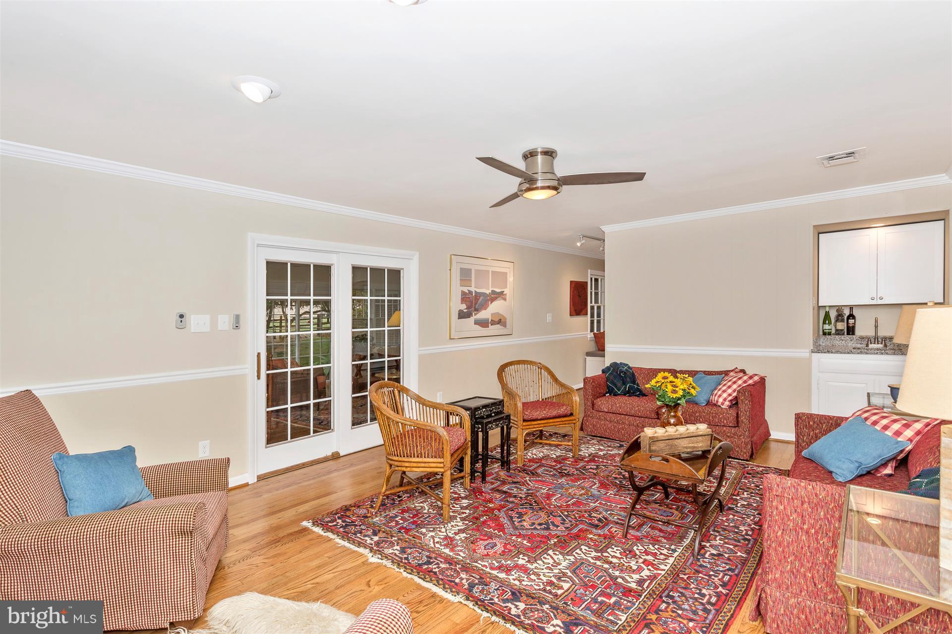 19639 Spring Creek Road Hagerstown, MD 21742 - Photo 13 of 30 family room w/wet bar and fireplace