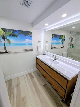 a bathroom with a shower and a toilet