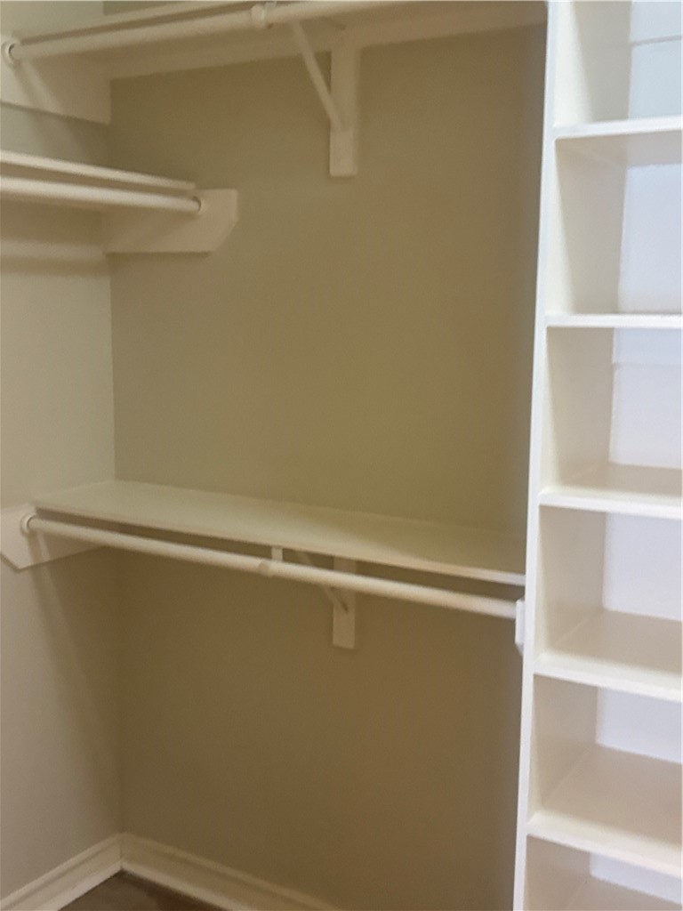 921 Moore Avenue Portland, TX 78374 - Photo 16 of 18 a view of a room with racks on the wall