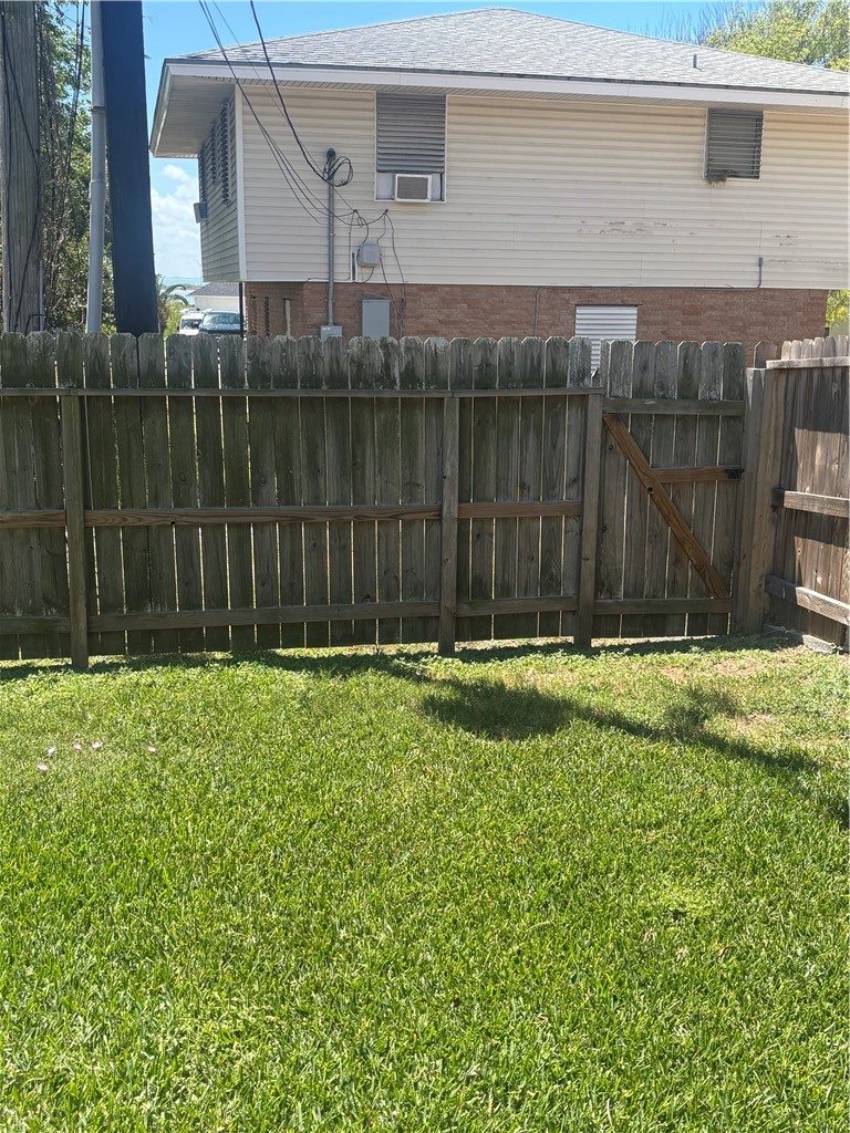 921 Moore Avenue Portland, TX 78374 - Photo 18 of 18 a view of a backyard with a garden