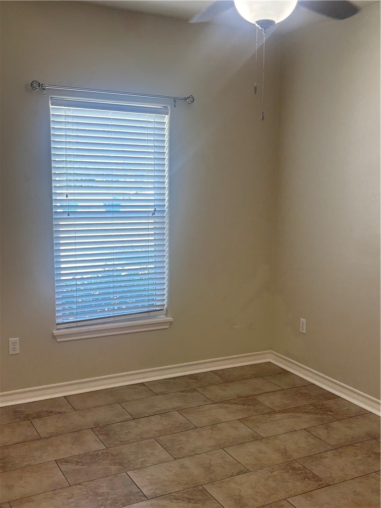 921 Moore Avenue Portland, TX 78374 - Photo 2 of 18 an empty room with a window
