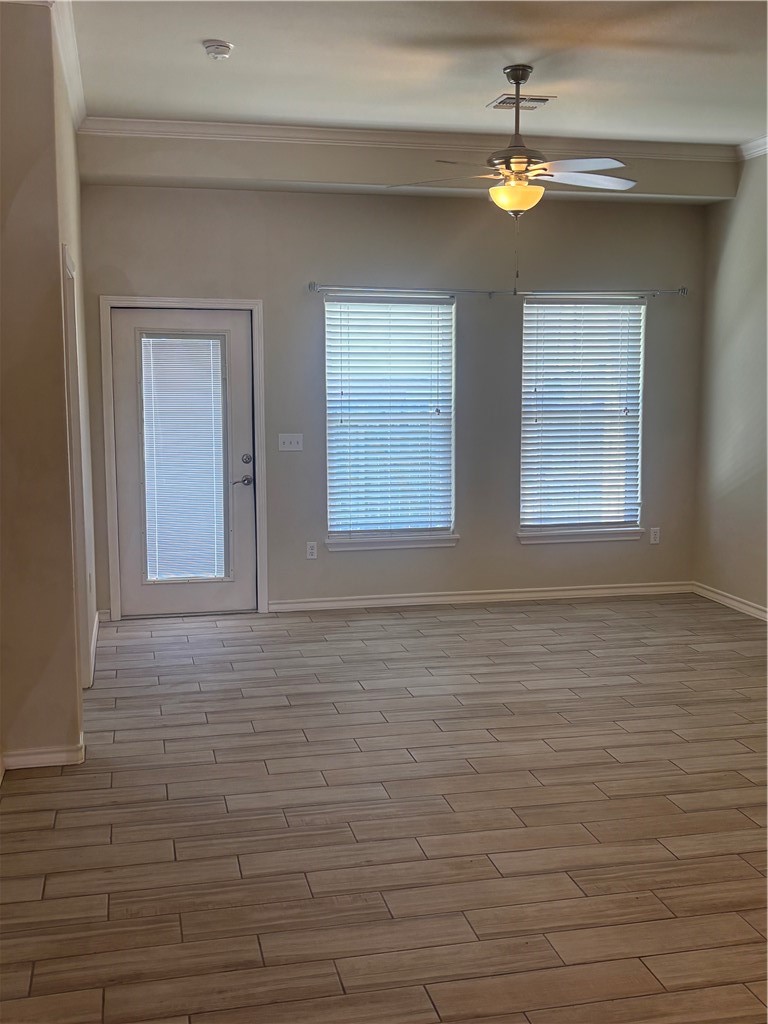 921 Moore Avenue Portland, TX 78374 - Photo 9 of 18 a view of an empty room with a window