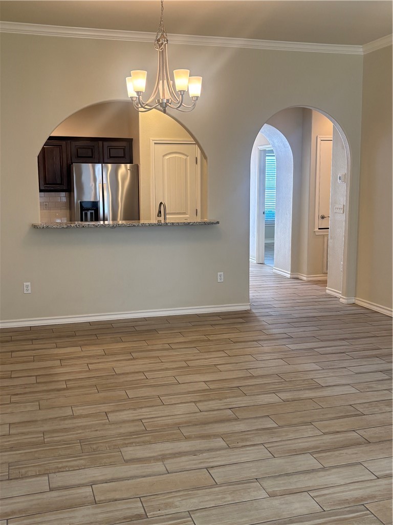 921 Moore Avenue Portland, TX 78374 - Photo 10 of 18 a view of a livingroom with a kitchen