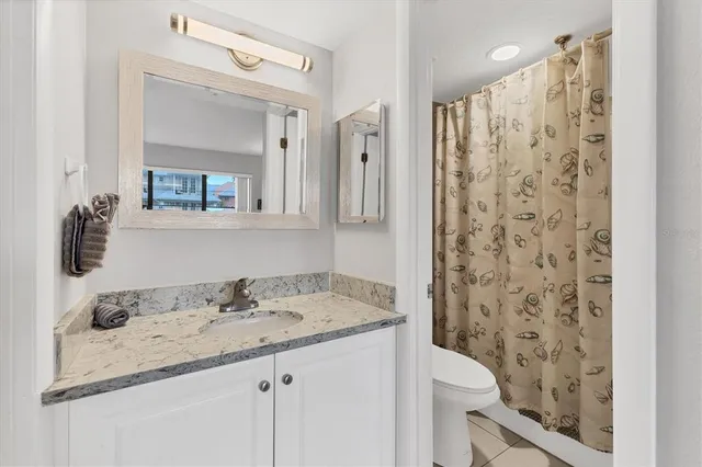 $700,000 | 1001 Benjamin Franklin Drive, Unit 201, Sarasota, FL 34236