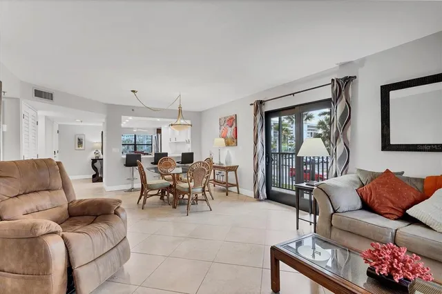 $700,000 | 1001 Benjamin Franklin Drive, Unit 201, Sarasota, FL 34236