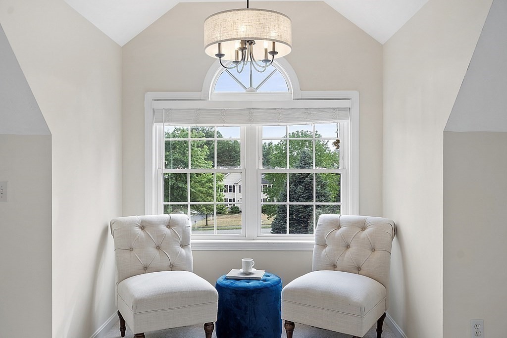 12 Whitetail Way Littleton, MA 01460 - Photo 21 of 39 a living room with furniture and a large window