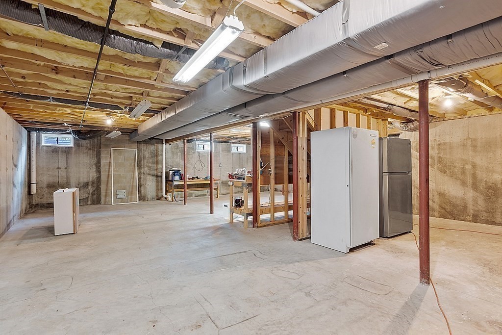 12 Whitetail Way Littleton, MA 01460 - Photo 30 of 39 a view of an empty room with wooden roof