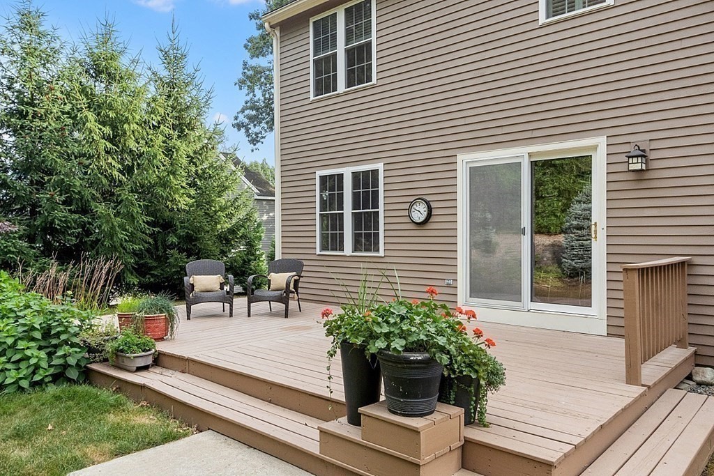12 Whitetail Way Littleton, MA 01460 - Photo 31 of 39 a view of a house with porch and sitting area