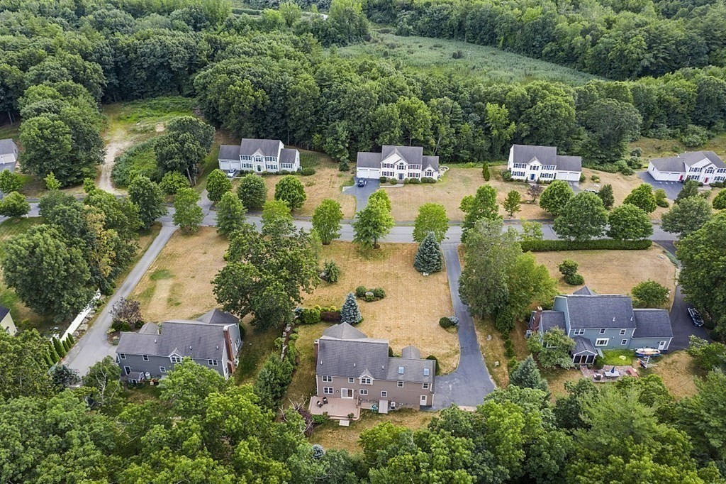 12 Whitetail Way Littleton, MA 01460 - Photo 34 of 39 an aerial view of house with yard swimming pool and outdoor seating