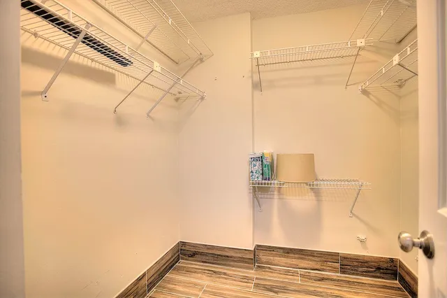 a view of a room with racks on the wall