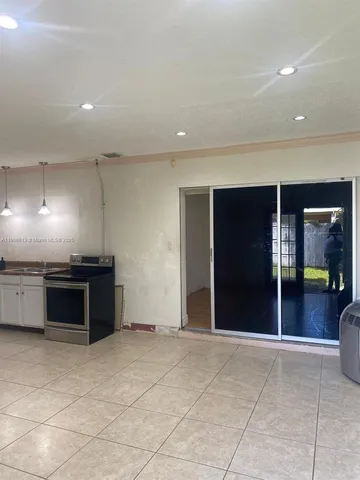 a view of backyard with cabin