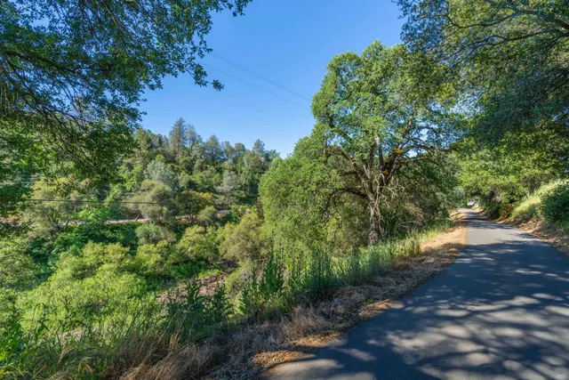a aerial view of a house with a yard